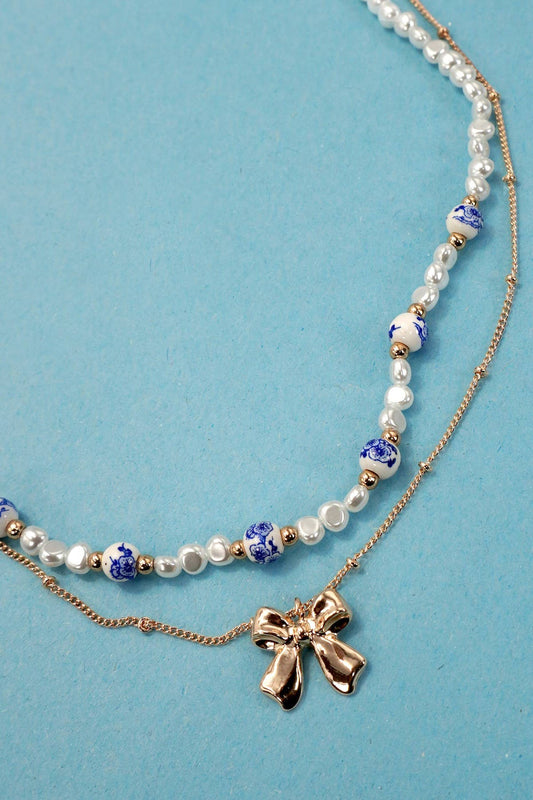CERAMIC PORCELAIN PEARL BOW LAYER NECKLACE |