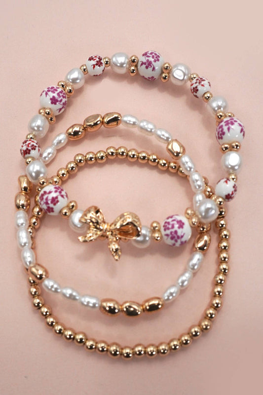 PINK CERAMIC PORCELAIN BOW MULTI LAYER BRACELET |
