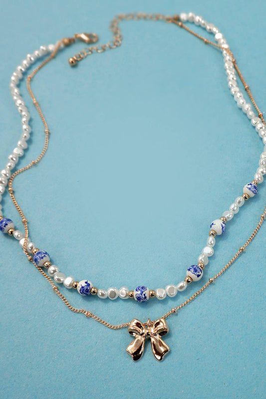 CERAMIC PORCELAIN PEARL BOW LAYER NECKLACE |