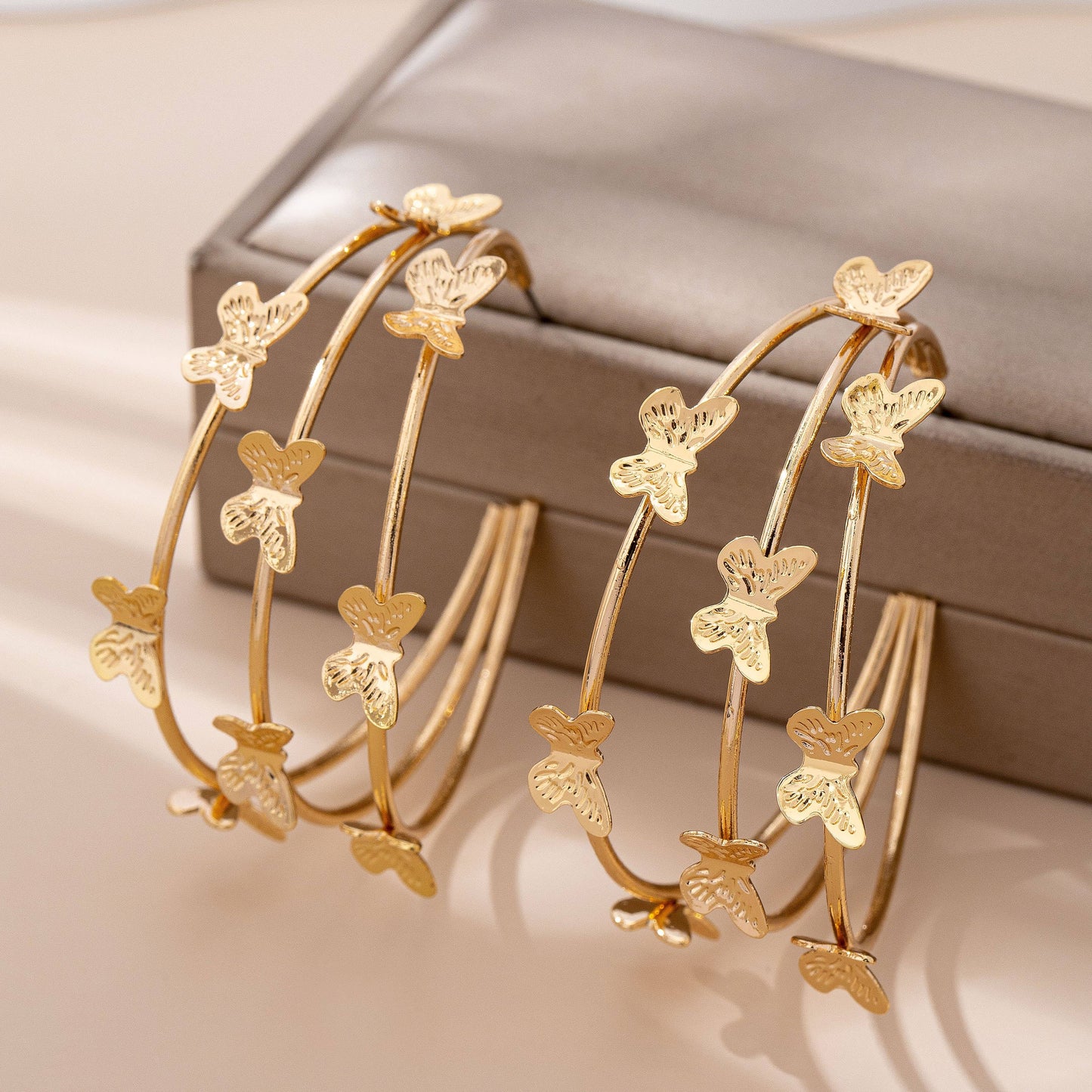Gold-Tone Triple Butterfly Hoop Earrings